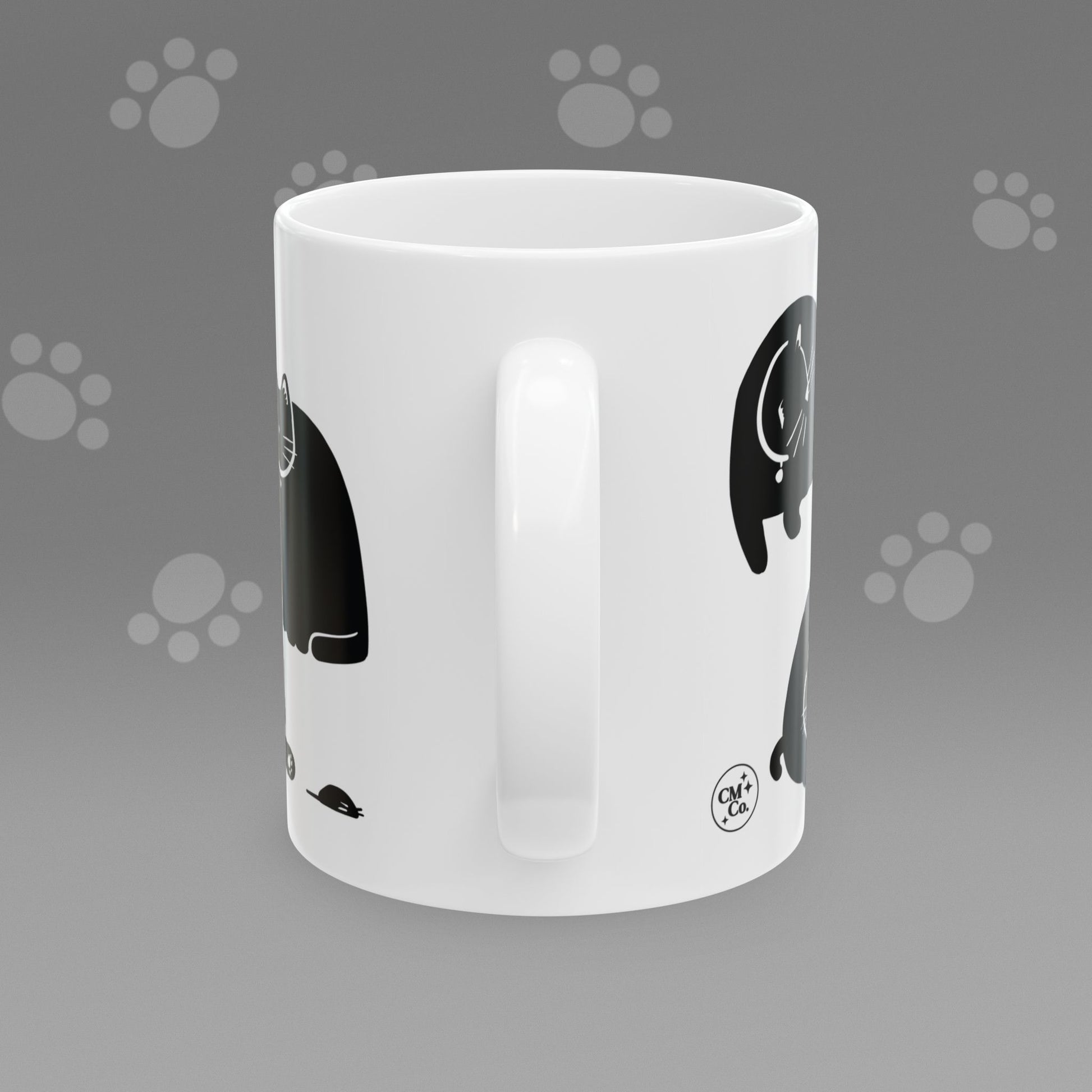 Coffee mug with fat black cat illustrations on a gray background