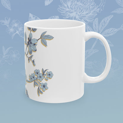 Coffee mug with blue floral pattern