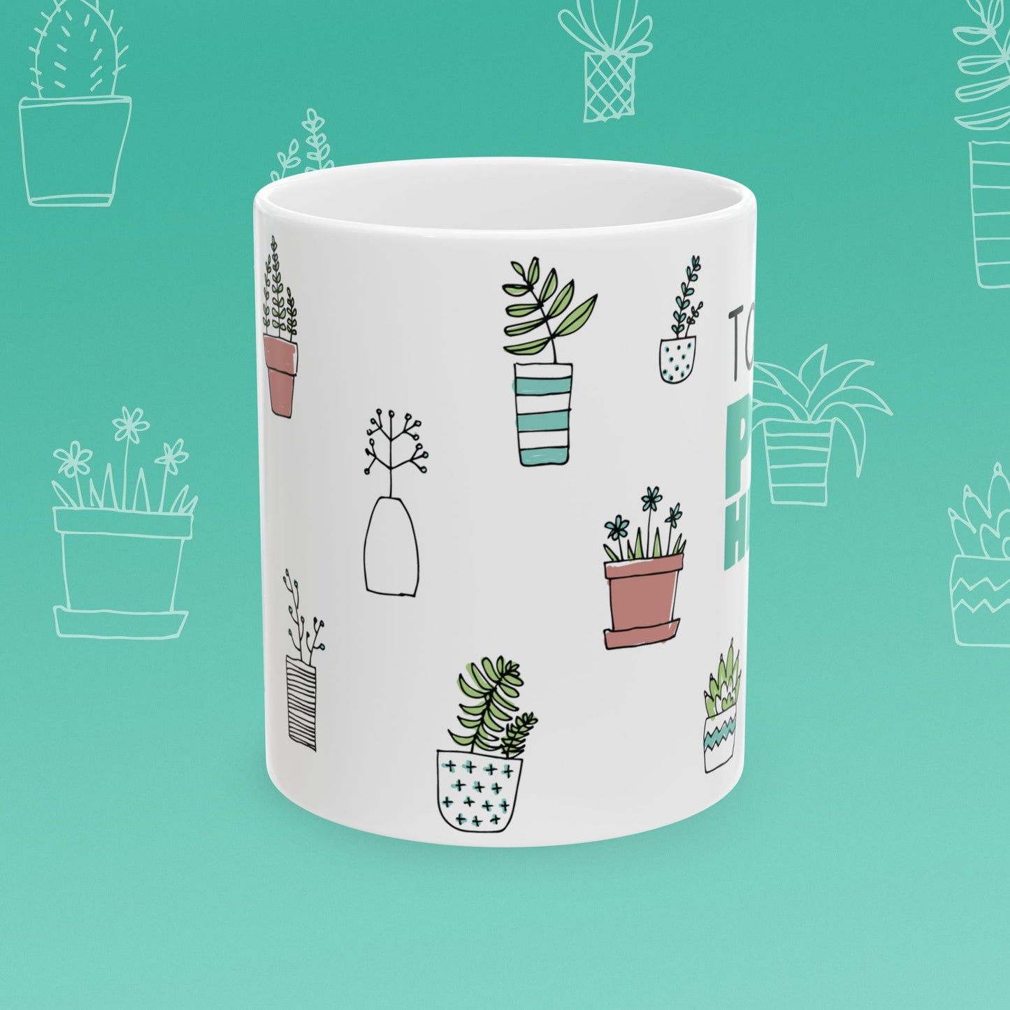 White mug with 'Total Pot Head' text and plant illustrations on a teal background