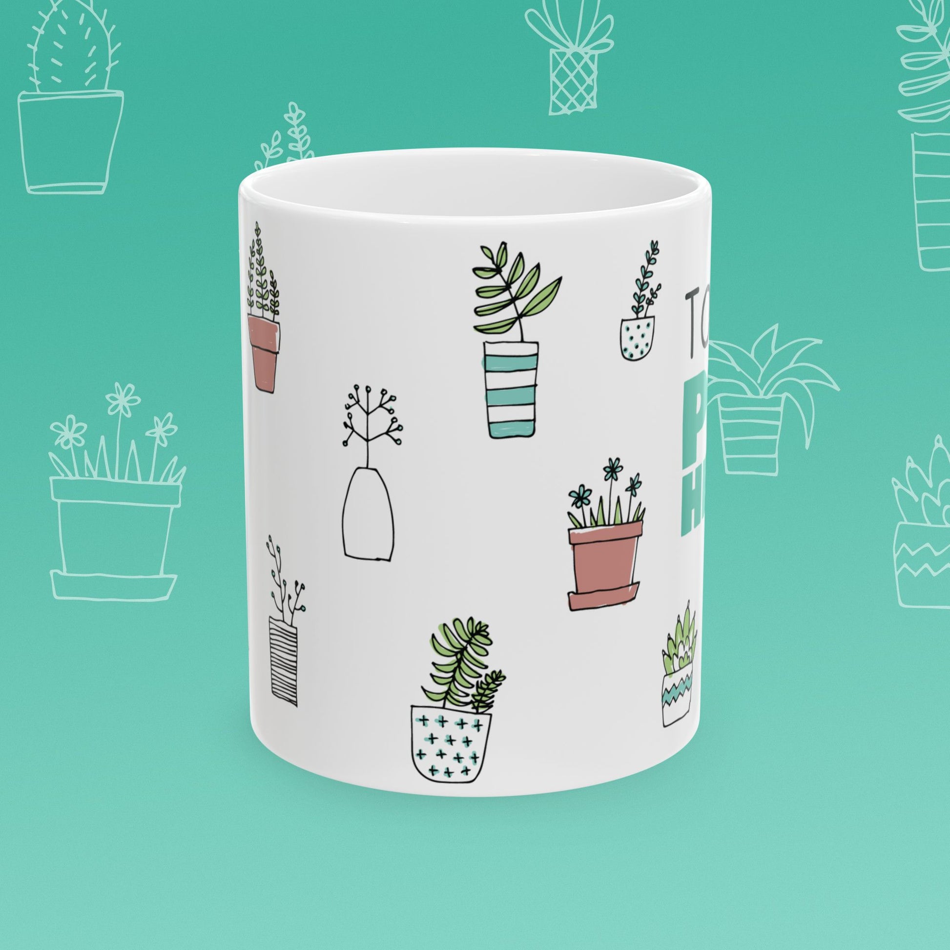 White mug with 'Total Pot Head' text and plant illustrations on a teal background