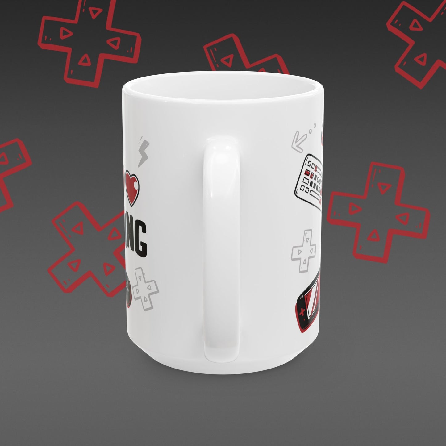 White mug with 'I ❤️ Gaming' design covered in illustrated game controllers