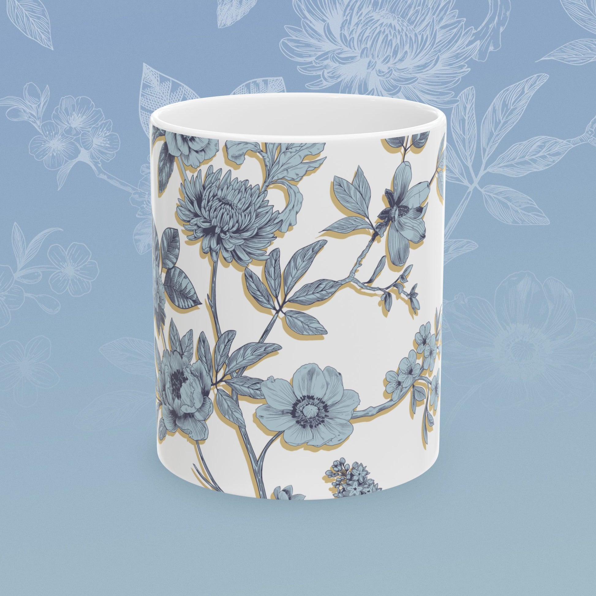Coffee mug with blue floral pattern
