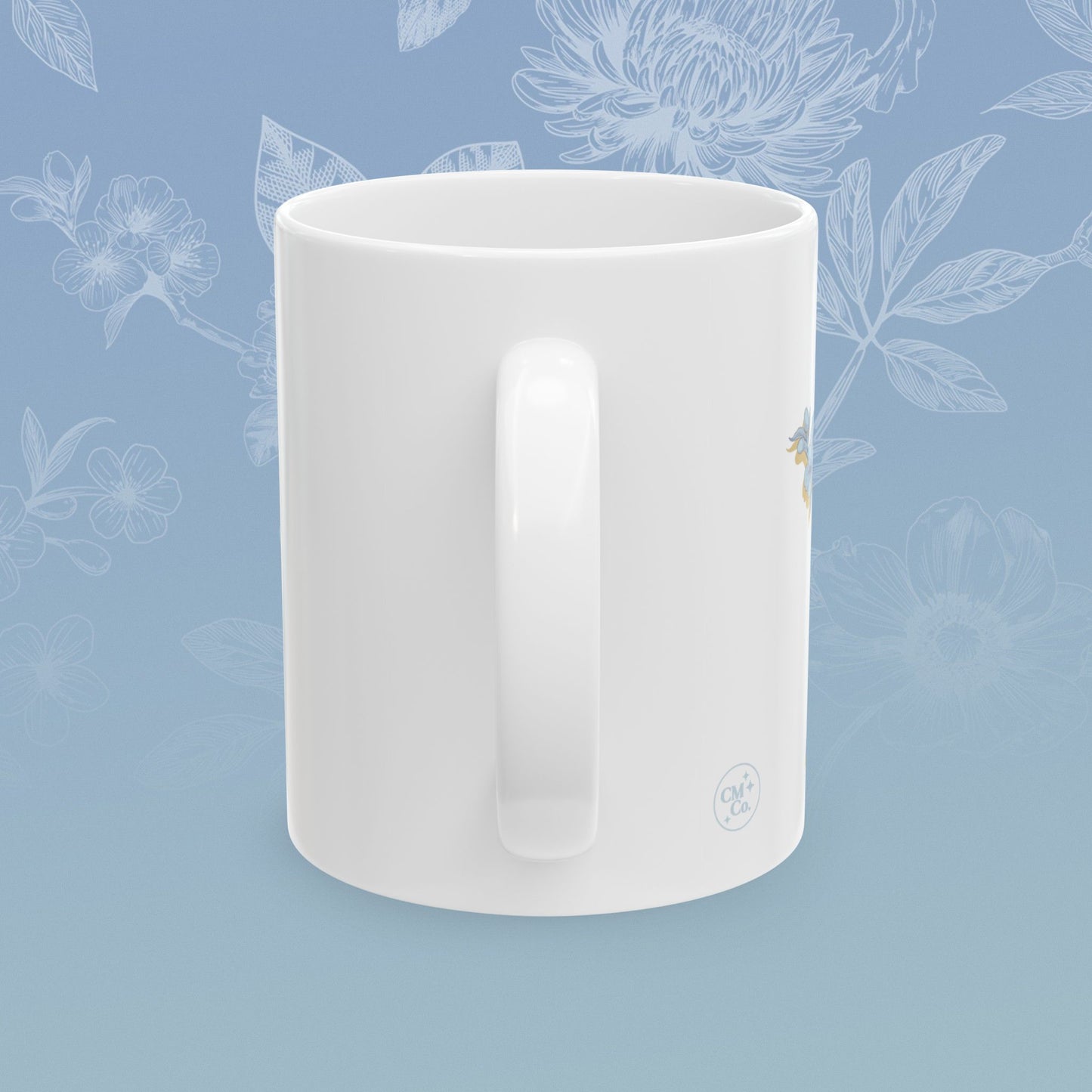 Coffee mug with blue floral pattern