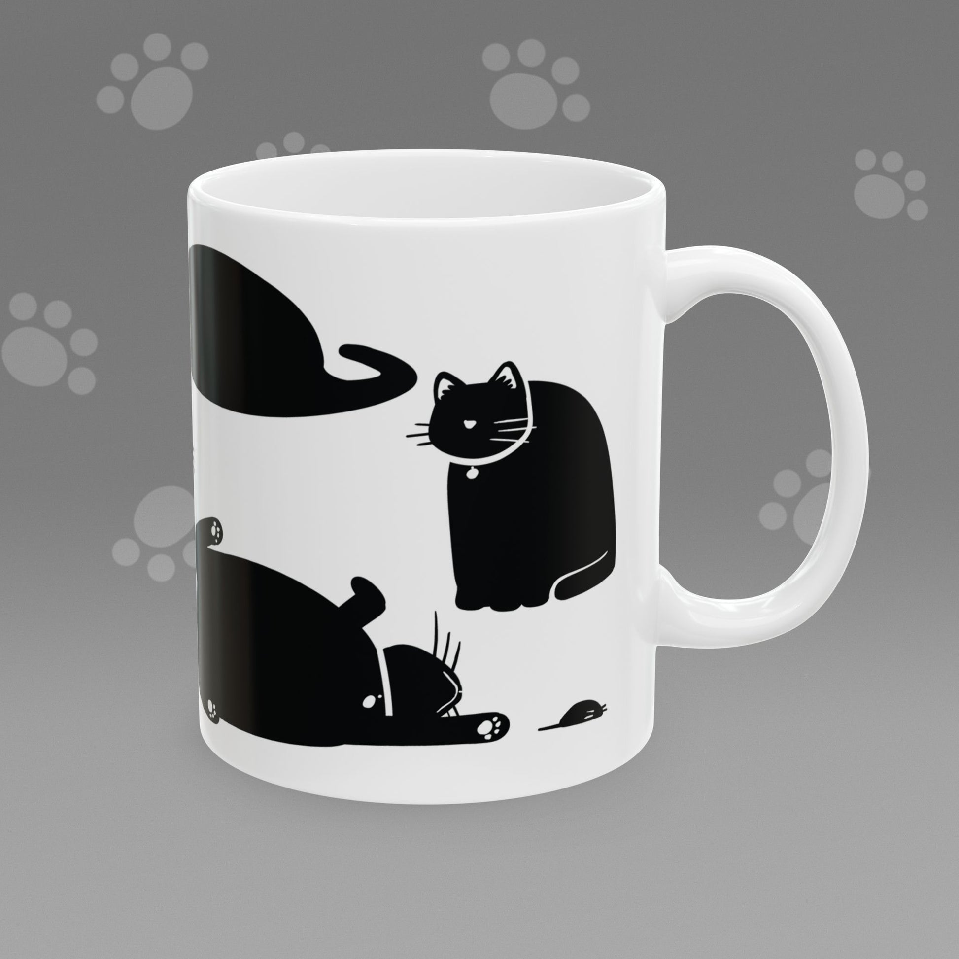 Coffee mug with fat black cat illustrations on a gray background