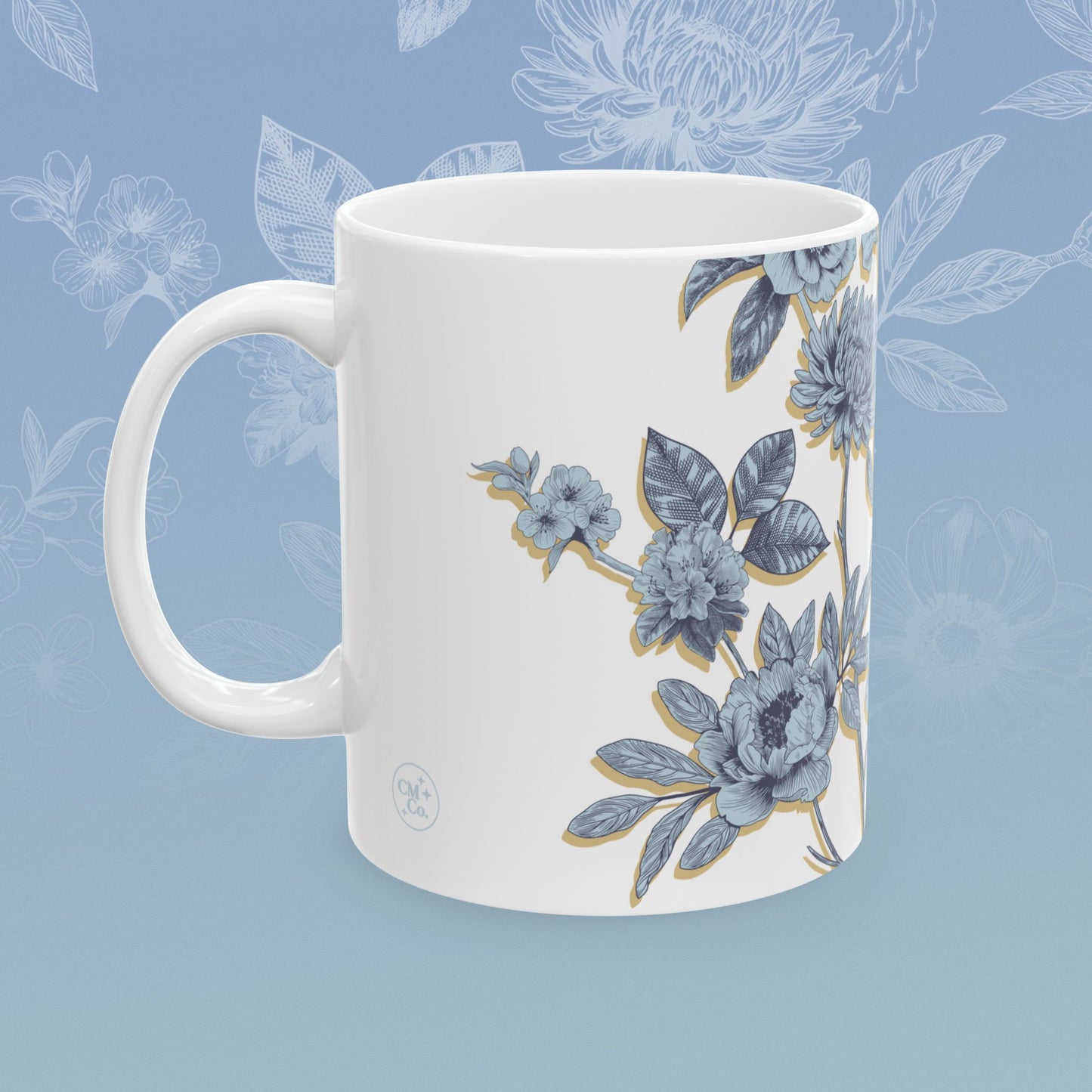 Coffee mug with blue floral pattern