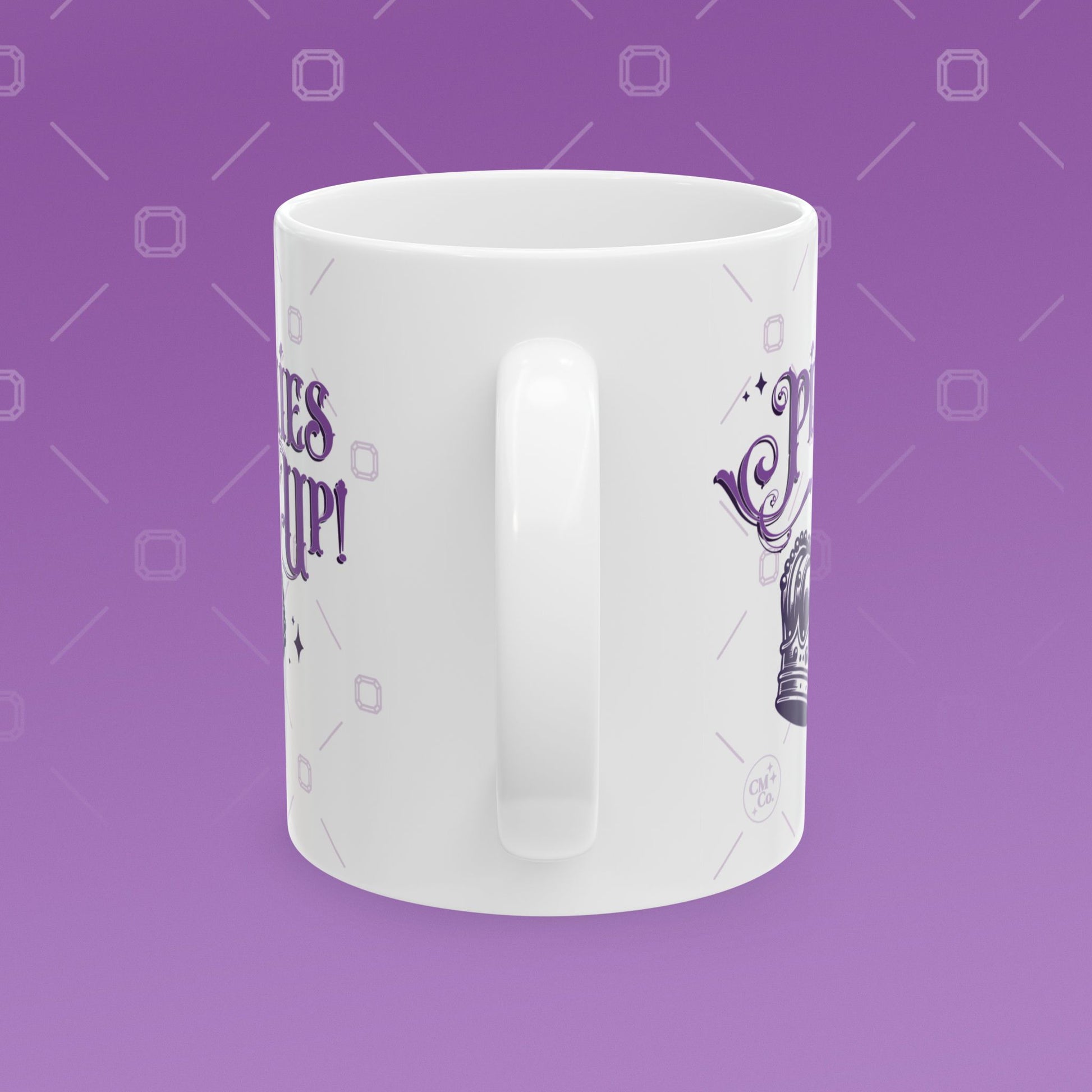 Coffee mug with the fancy text "Pinkies Up" over the illustration of a crown
