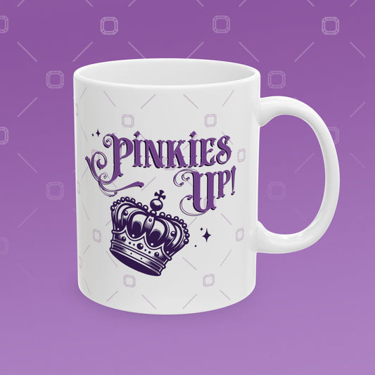 Coffee mug with the fancy text "Pinkies Up" over the illustration of a crown