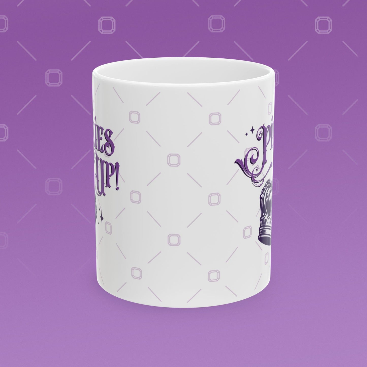 Coffee mug with the fancy text "Pinkies Up" over the illustration of a crown