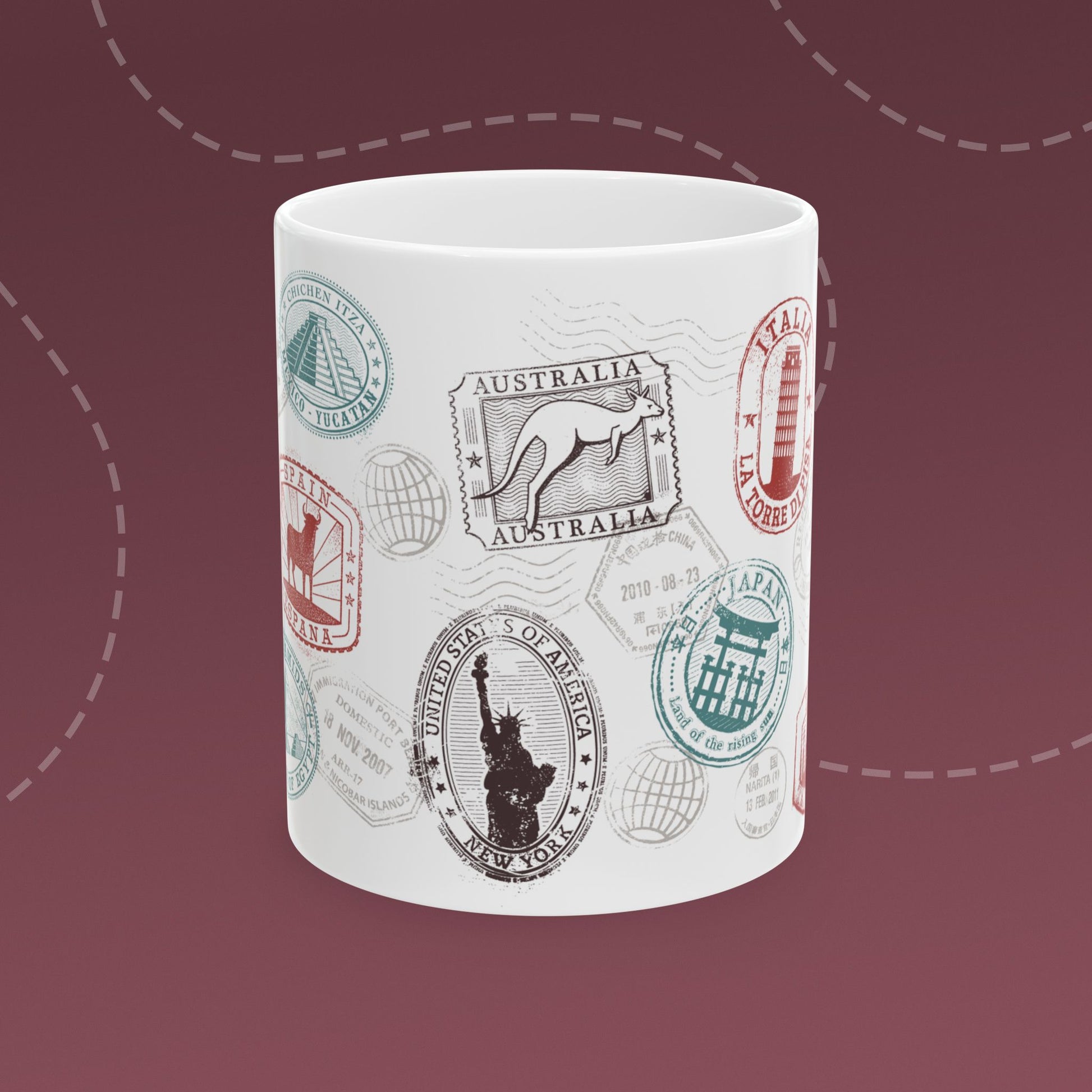 Coffee mug with colorful passport stamp illustrations