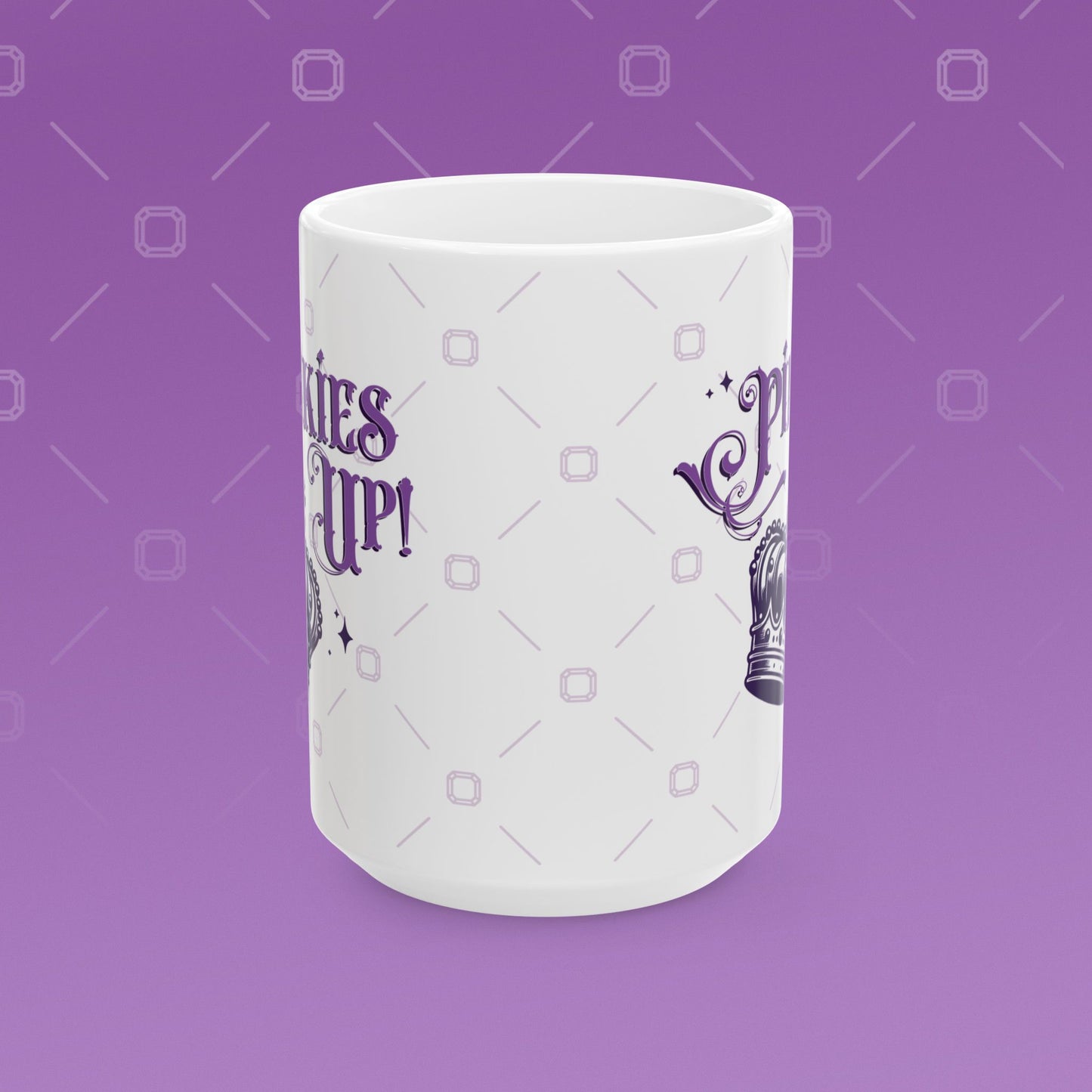 Coffee mug with the fancy text "Pinkies Up" over the illustration of a crown