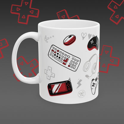 White mug with 'I ❤️ Gaming' design covered in illustrated game controllers