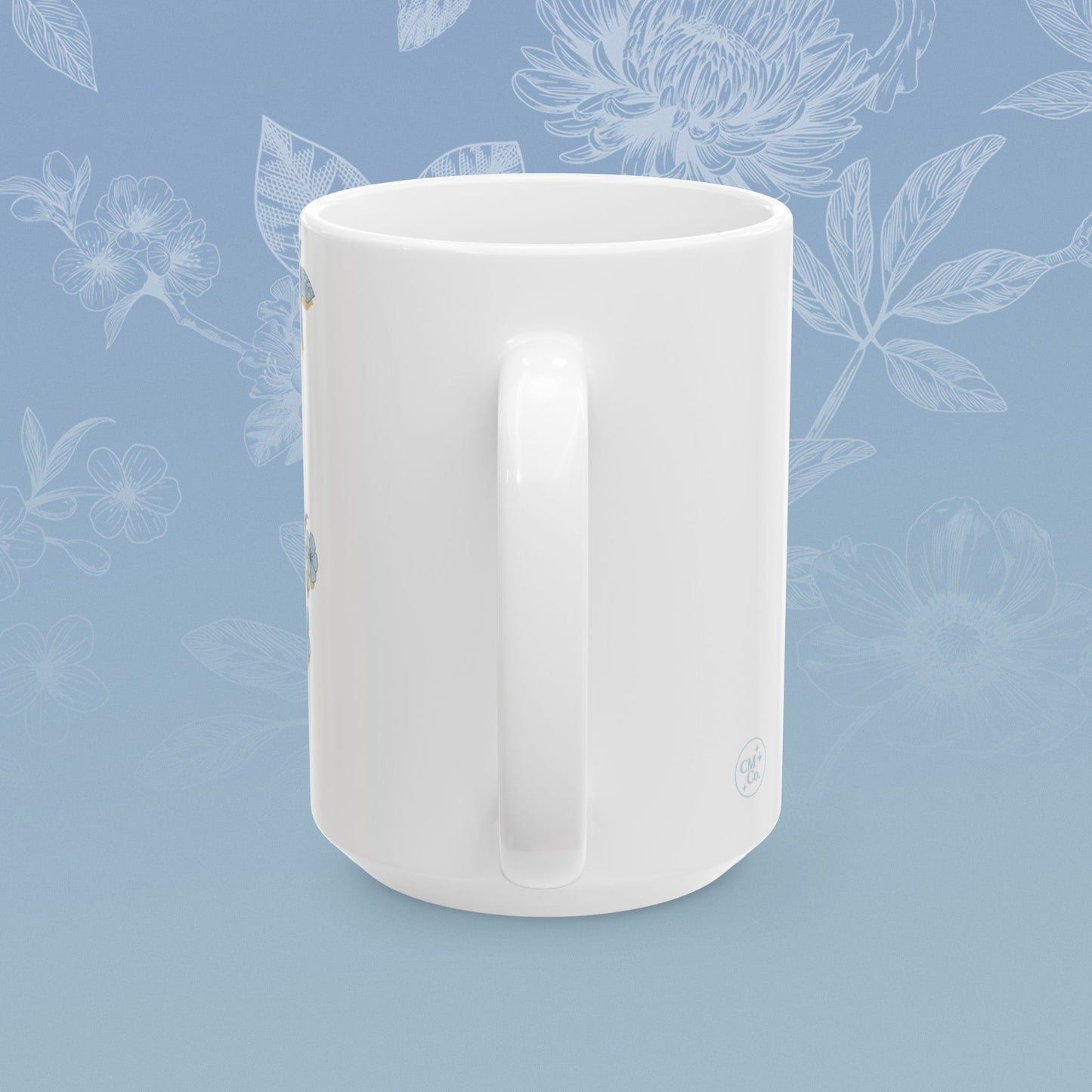 Coffee mug with blue floral pattern