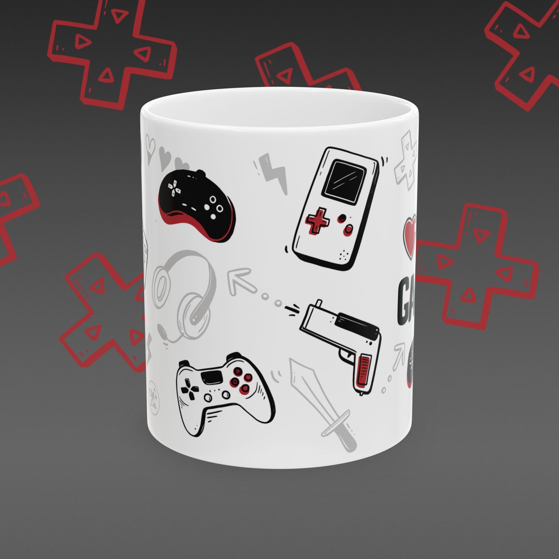 White mug with 'I ❤️ Gaming' design covered in illustrated game controllers