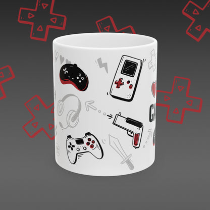 White mug with 'I ❤️ Gaming' design covered in illustrated game controllers