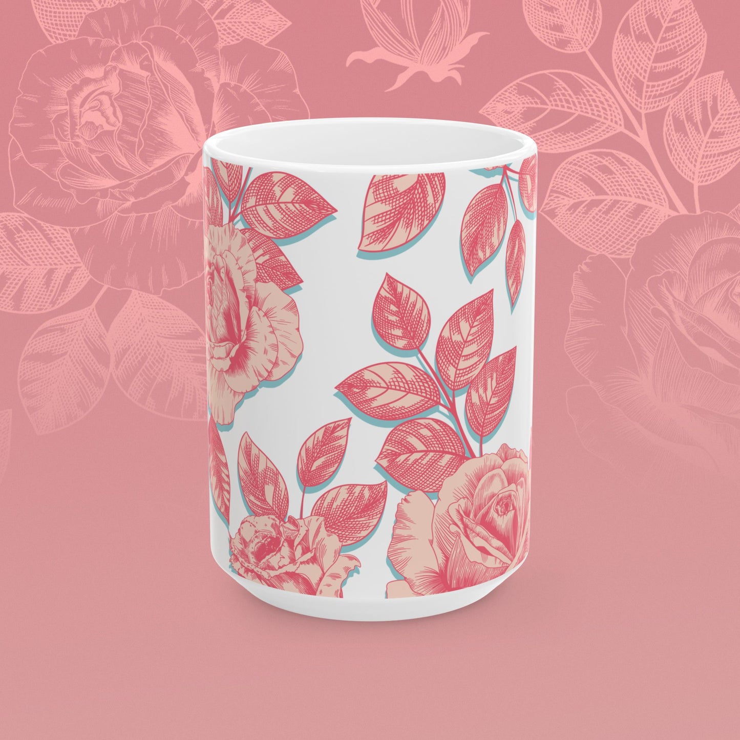 coffee mug decorated with blooming roses in shades of pink.