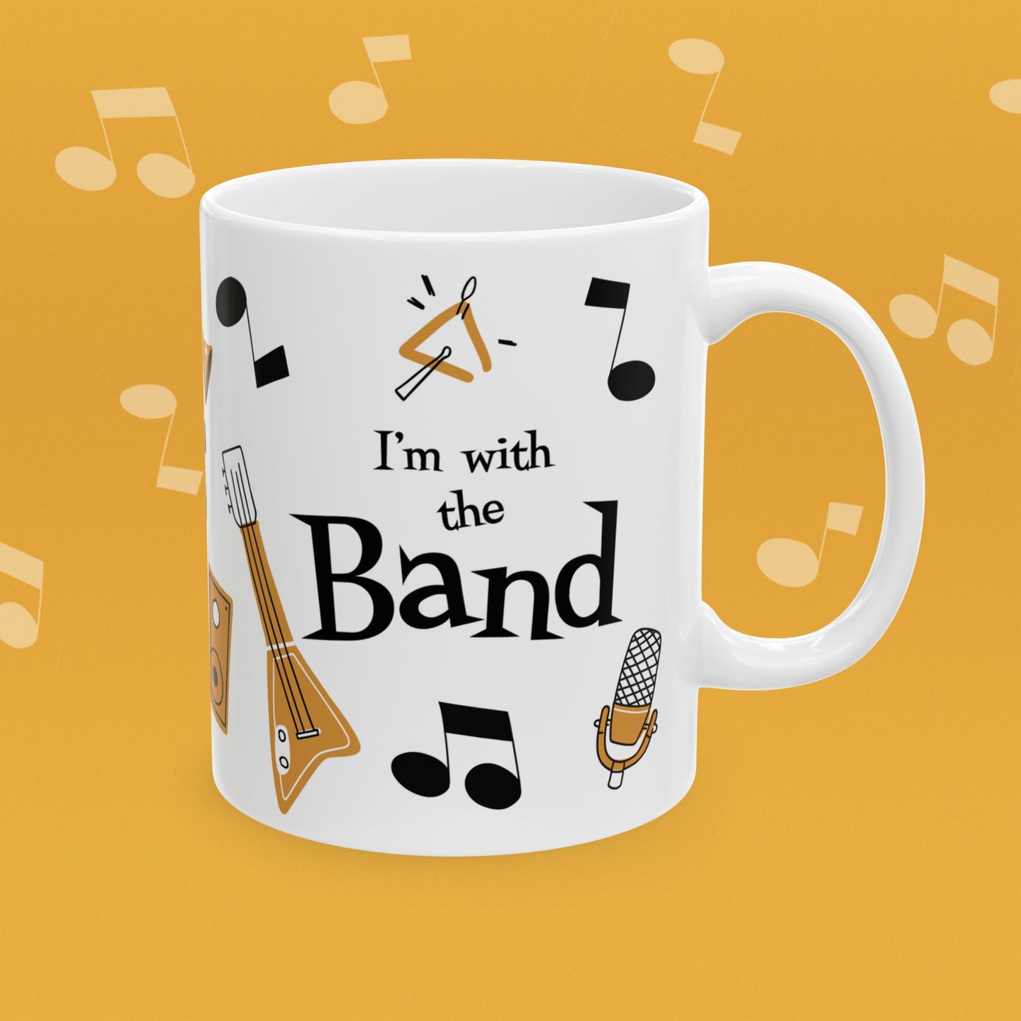 Coffee mug with musical instrument illustrations and text 'I'm with the Band' on a yellow background
