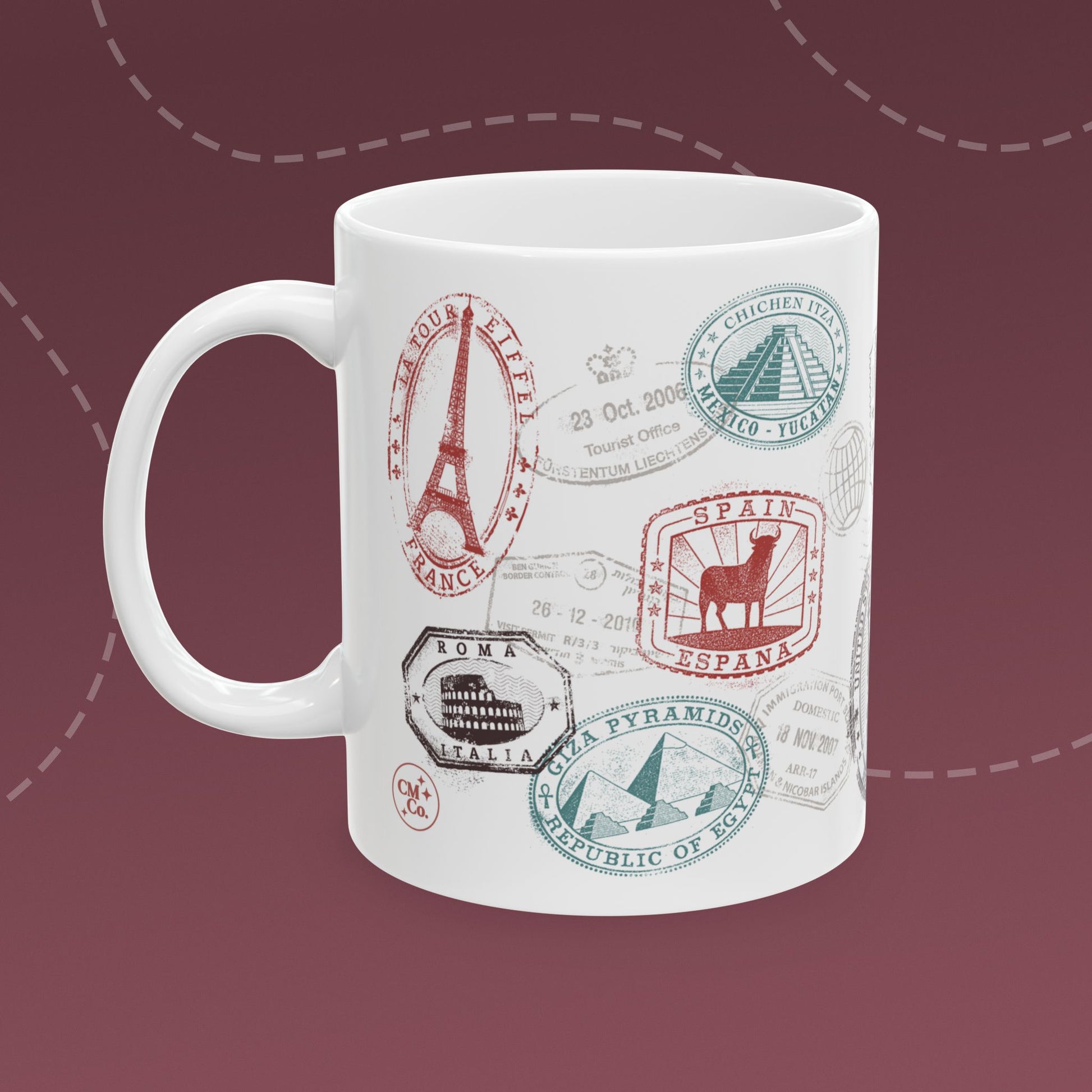 Coffee mug with colorful passport stamp illustrations