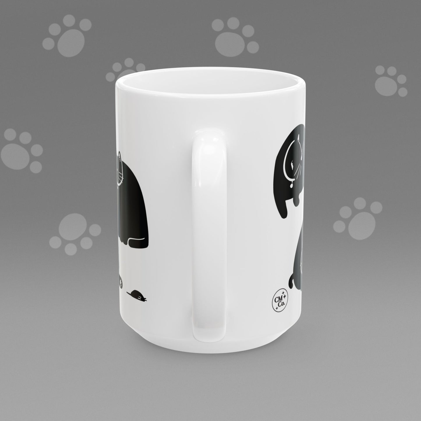 Coffee mug with fat black cat illustrations on a gray background