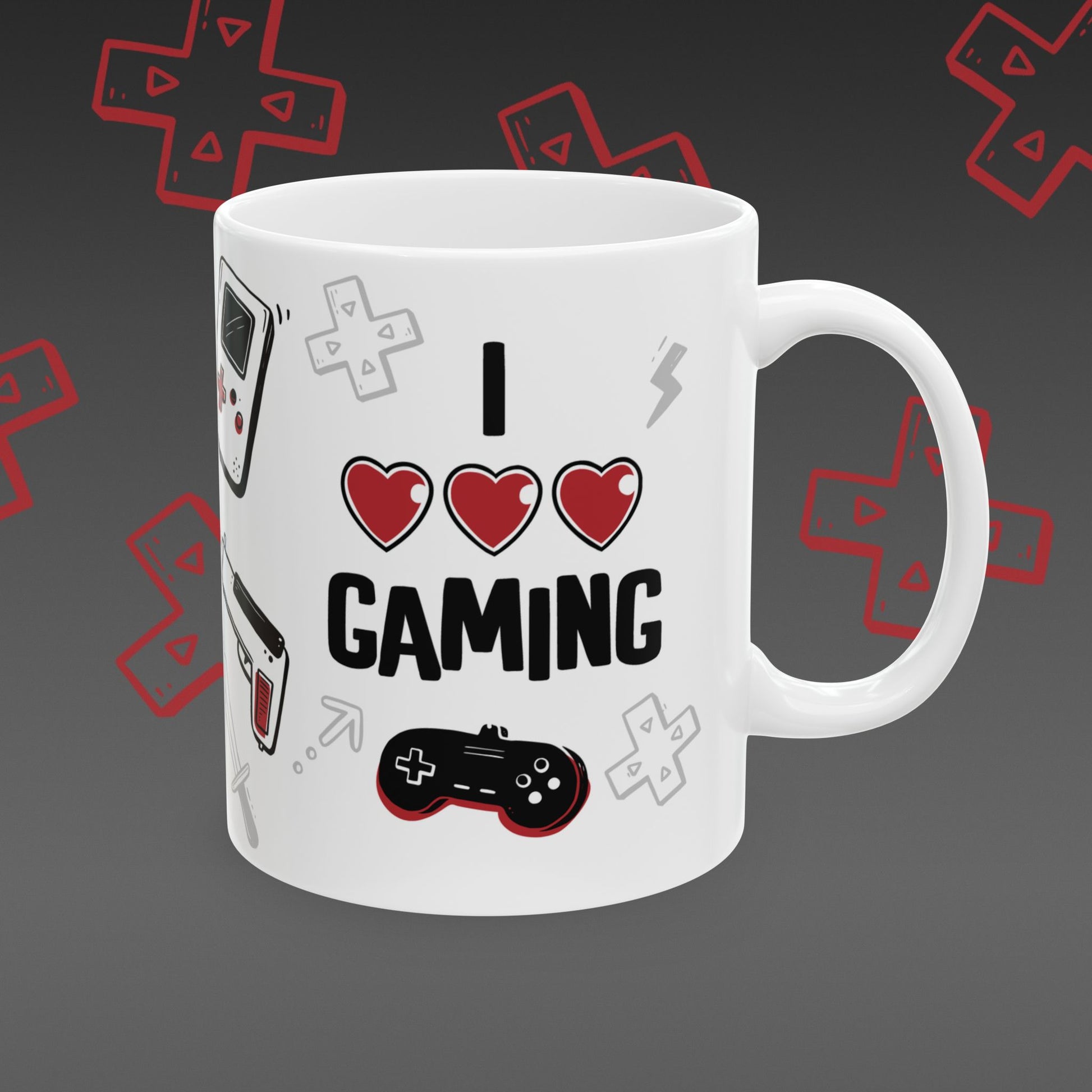 White mug with 'I ❤️ Gaming' design covered in illustrated game controllers
