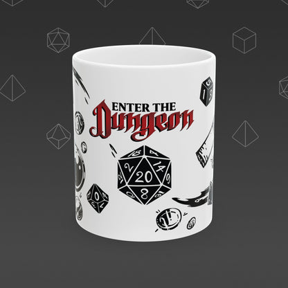 White mug with 'Enter the Dungeon' text and DND designs on a dark background