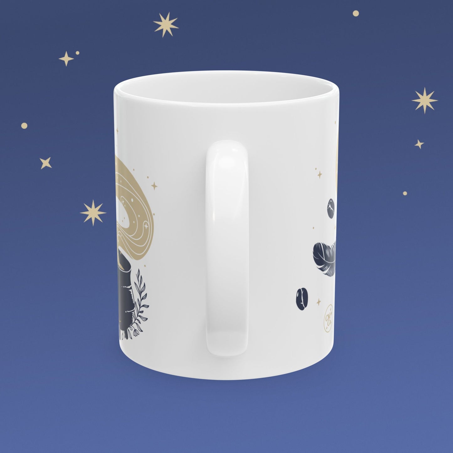 White mug with celestial design on a blue background with stars