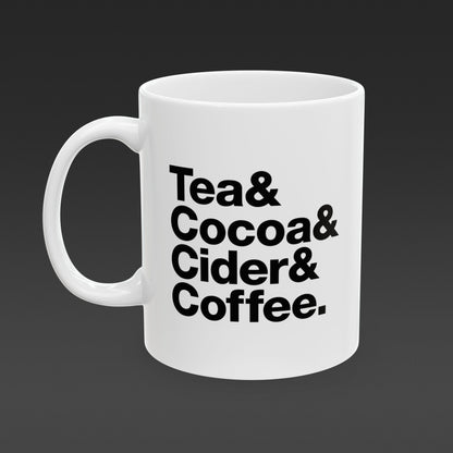 Coffee mug that reads "Tea & Cocoa & Cider & Coffee" . Black type on white mug