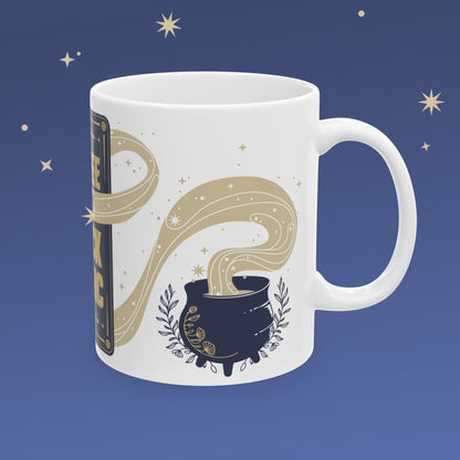 White mug with a decorative design of a magic cauldron on a blue background with stars.