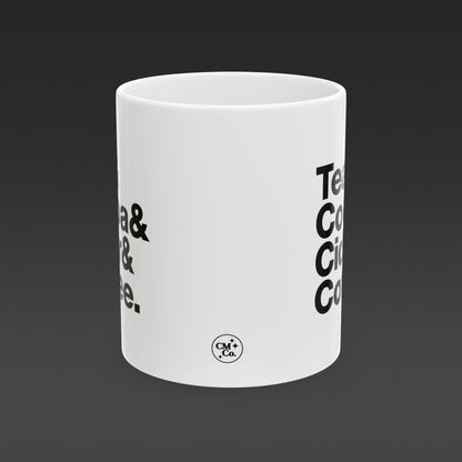 Coffee mug that reads "Tea & Cocoa & Cider & Coffee" . Black type on white mug
