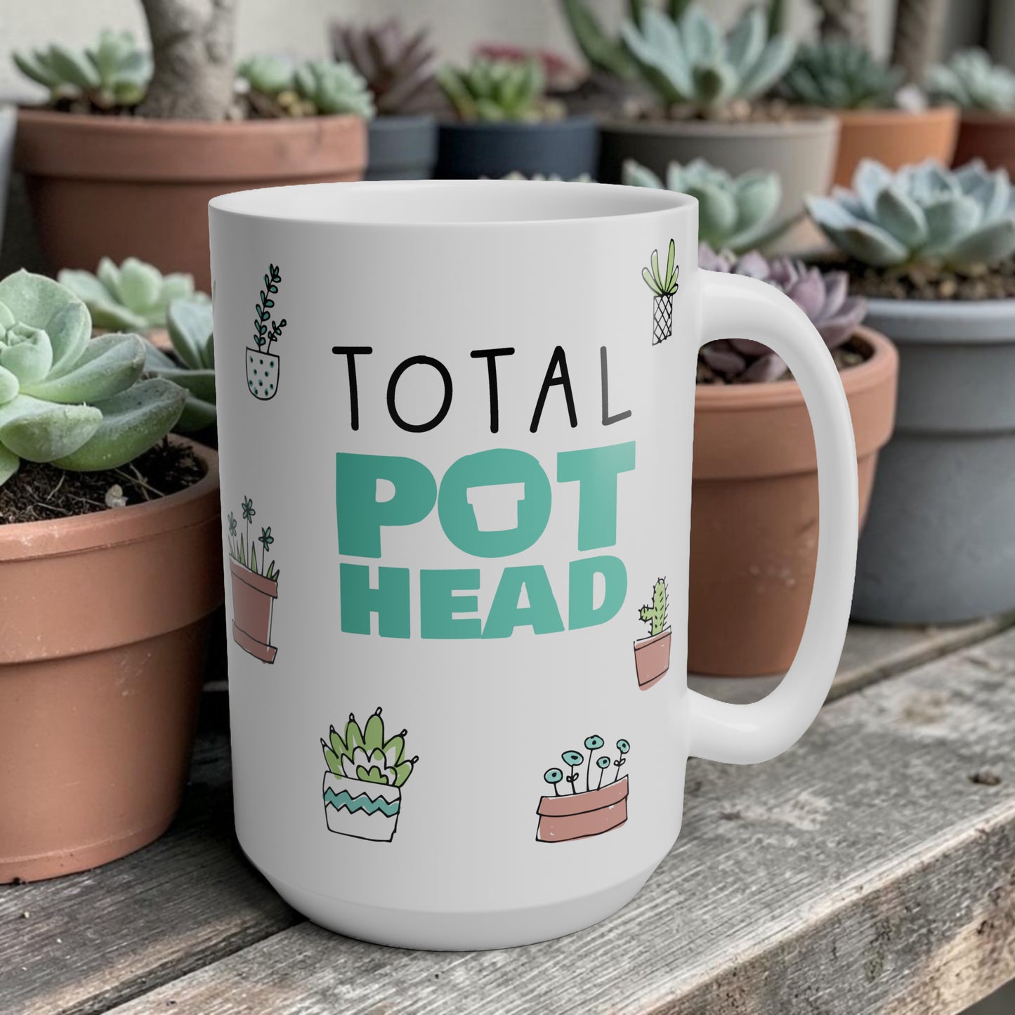 White mug with 'Total Pot Head' text and plant illustrations in front of potted plants.